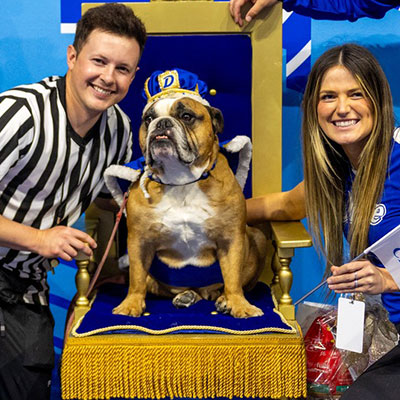 2025, Milo and his owners Kayla Armstrong, BN'17 and Cole Henry
