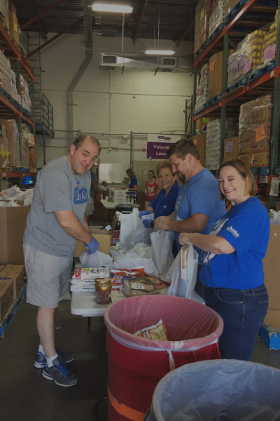 Group of Alumni Volunteering