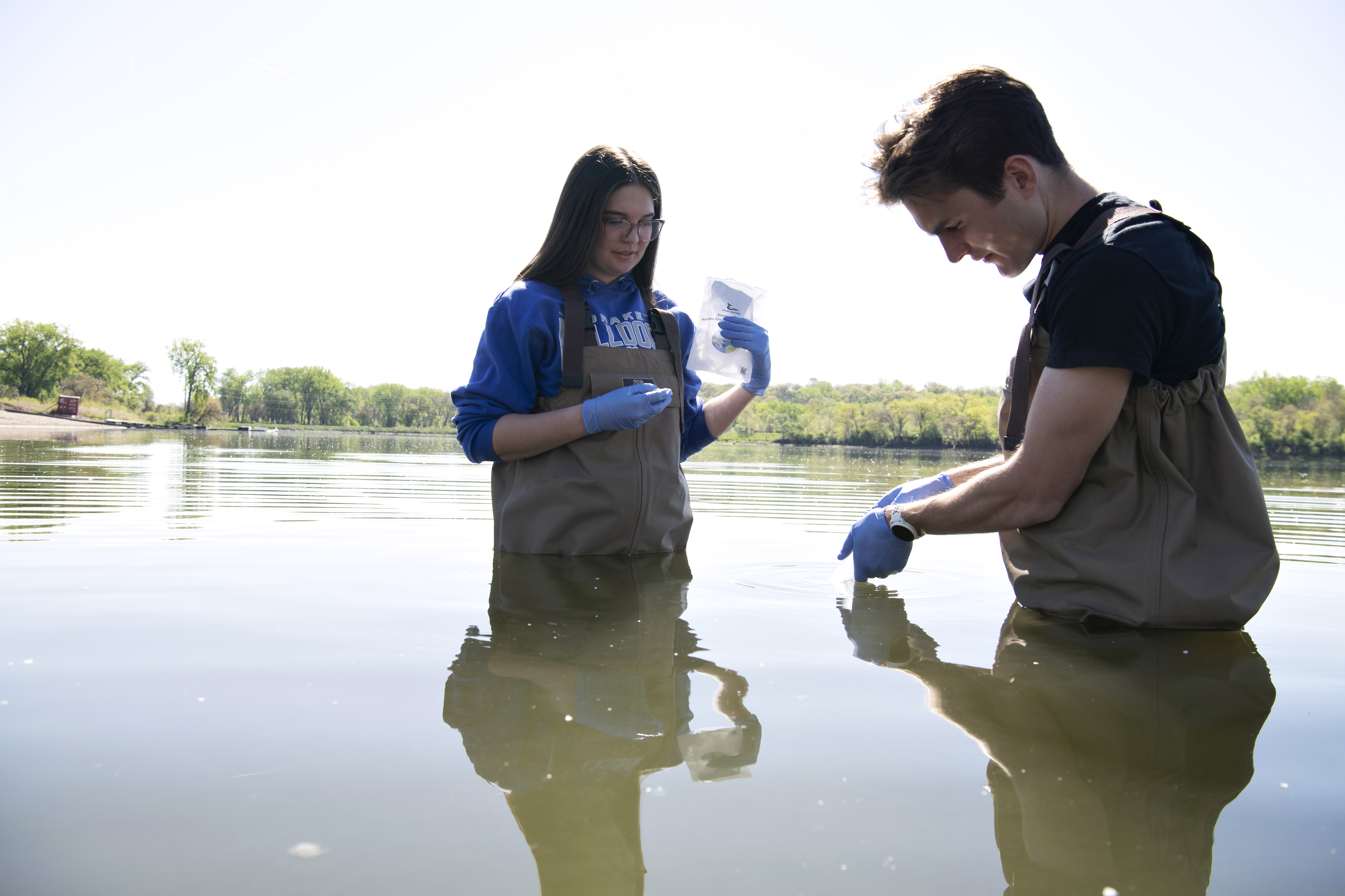 Photo of environmental science students working in the field