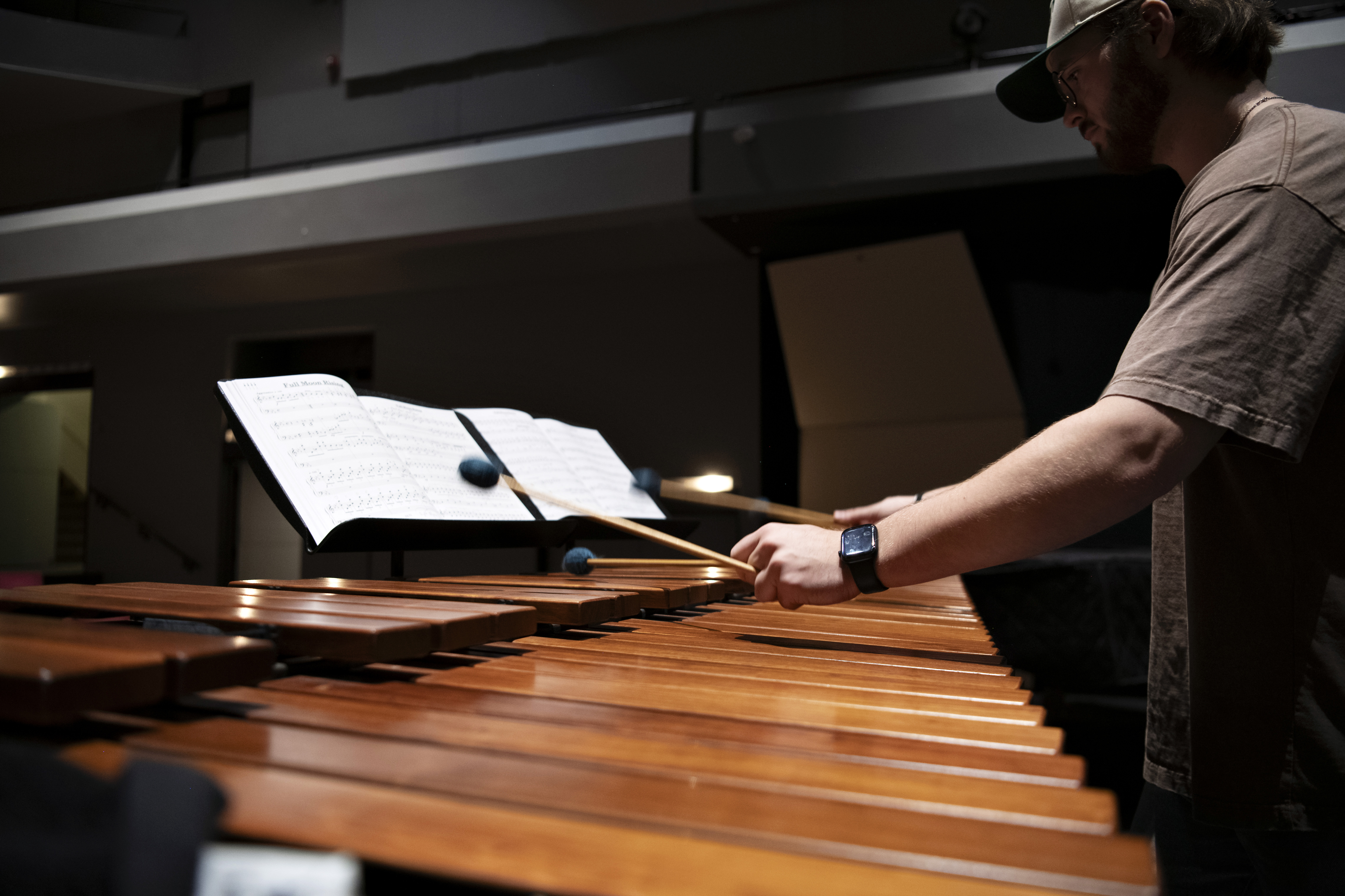 Student playing percussion 