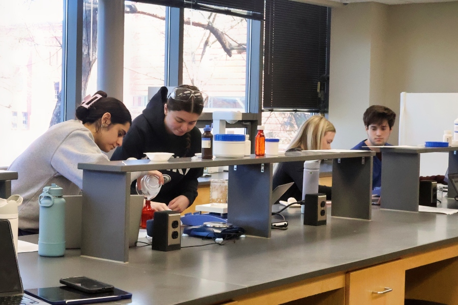 Drake pharmacy students work with medications in non sterile compounding lab