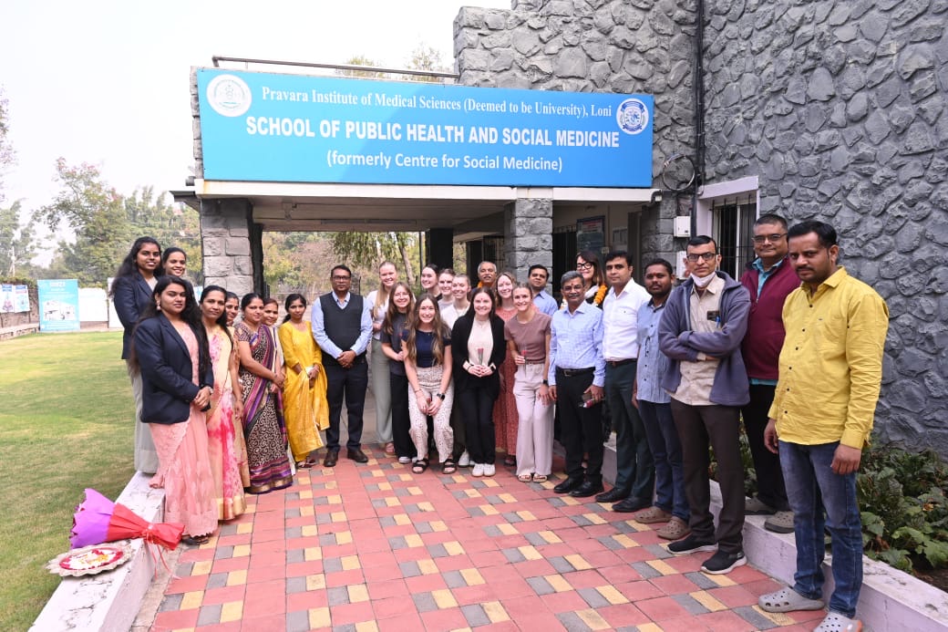 A group of Drake students and Indian medical students and staff pose outside the Pravara Institute of Medical Sciences