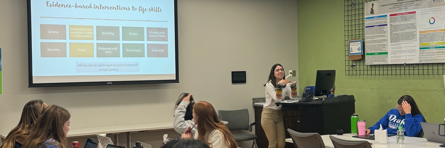Lauryn Pritchard lectures to a classroom of younger OT students