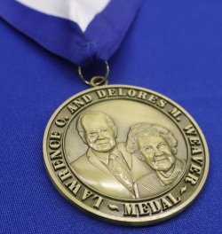 Weaver Medal of Honor closeup on blue tablecloth