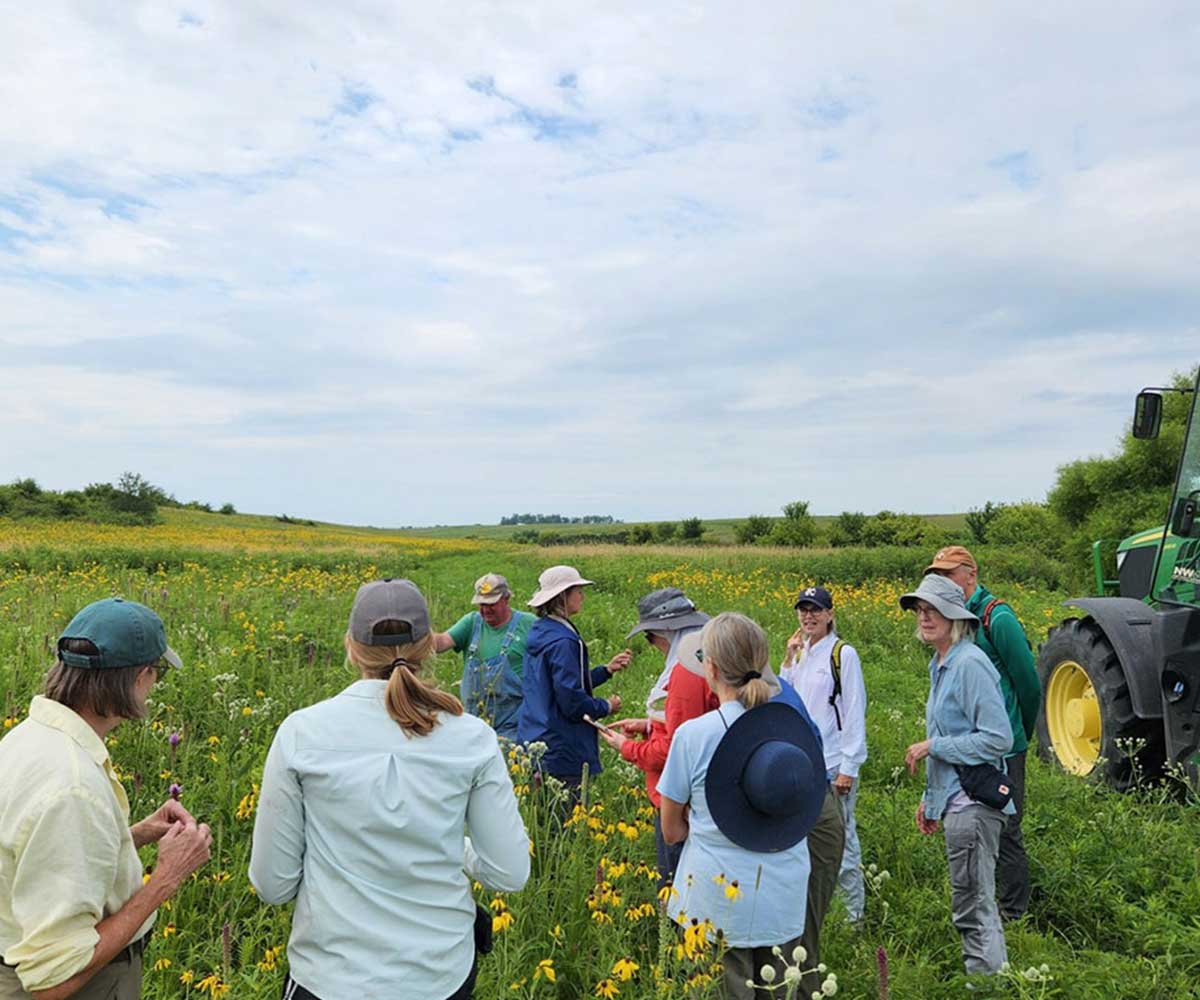 Group of people touring the Dunn Ranch.