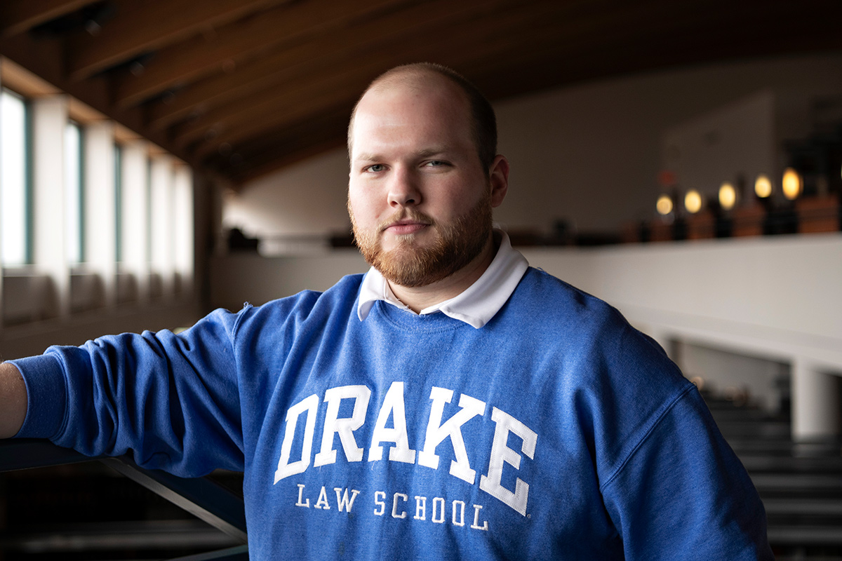 Male Drake University Law School student inside Cartwright Hall on Drake University's campus.