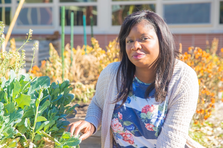 a doc student working in a school garden