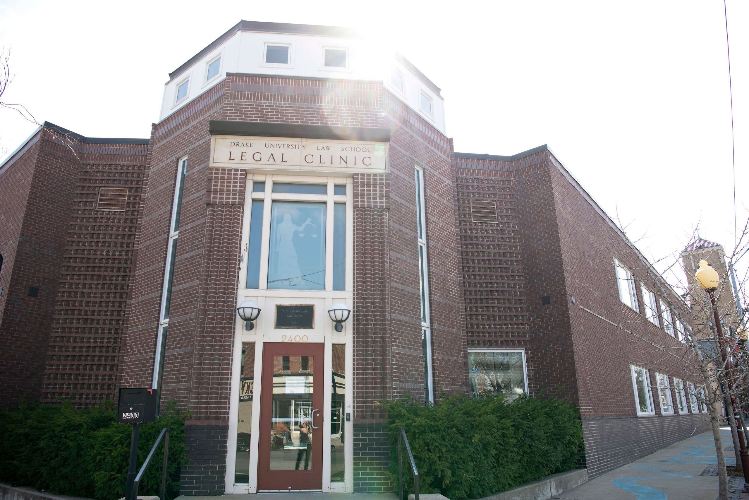 The brick exterior of Drake University's Legal Clinic, where law students take on pro bono cases