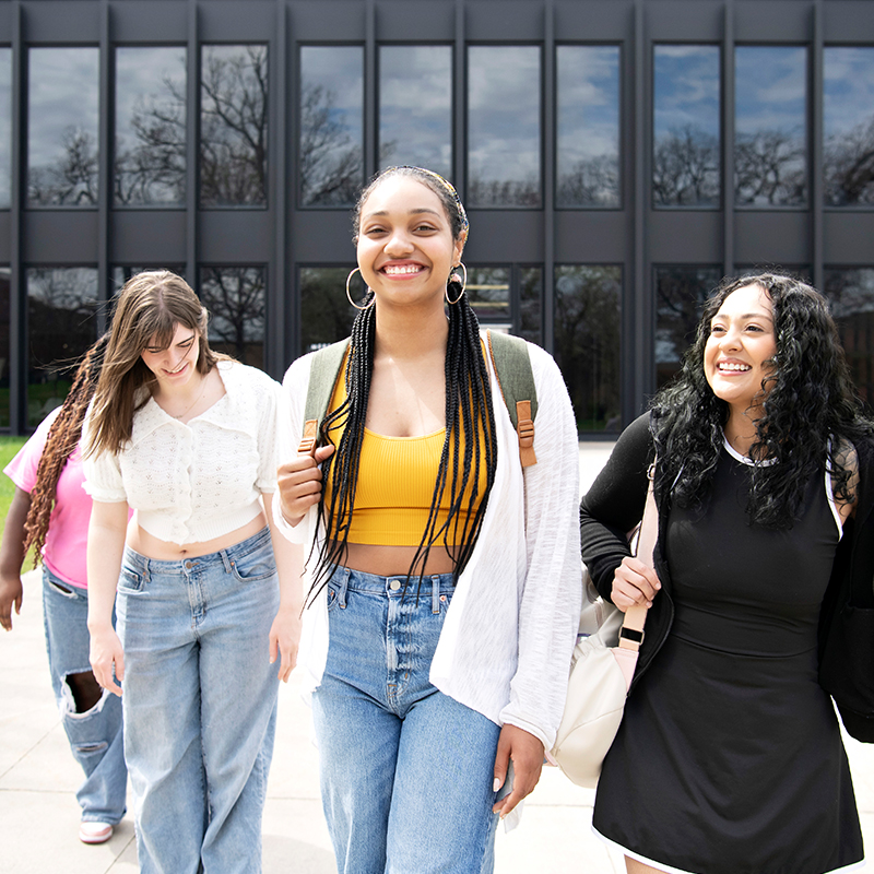 A group of students depart from Drake University's Bright College