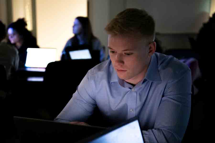 An Artificial Intelligence student learns more about natural language processing and models in a Drake computer lab