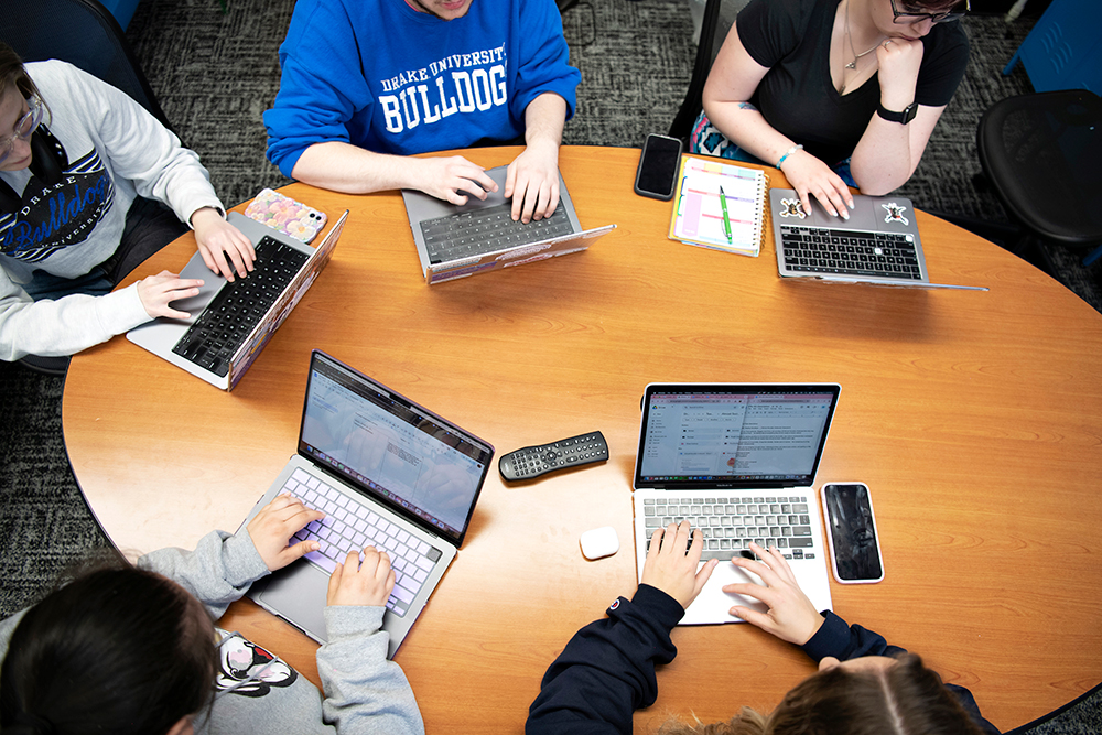 Students from Drake's computer science program tackle a challenge during a coding competition