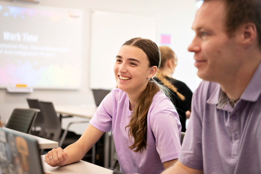 A student organization related to Human Resource Management gathers in a classroom on Drake's campus