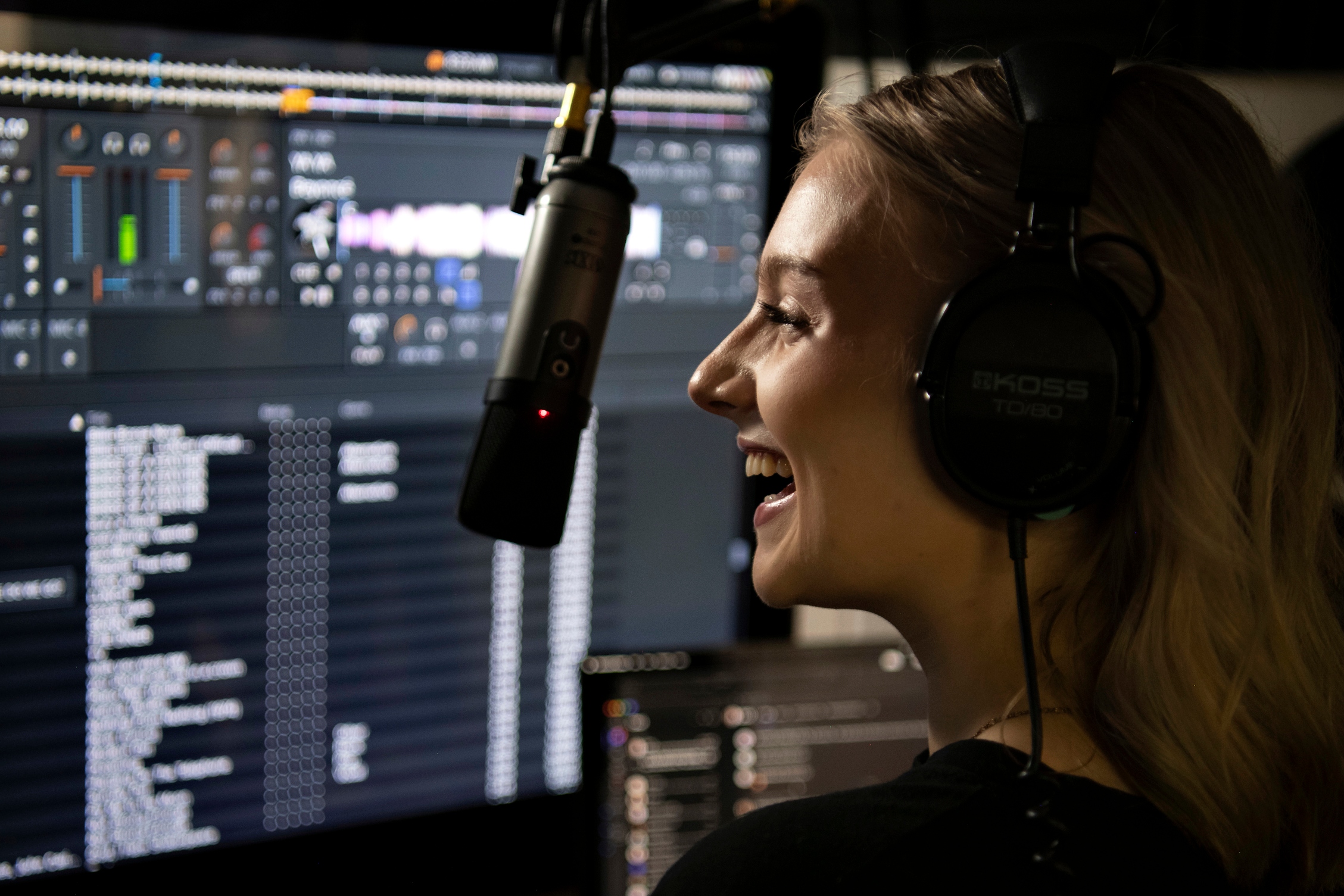 A Drake Multimedia Journalism Major gets practice on audio equipment ahead of internships and real-world production jobs