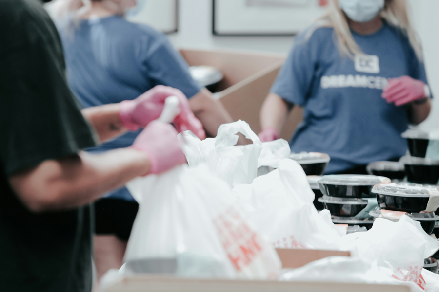 Students assembling bags of food