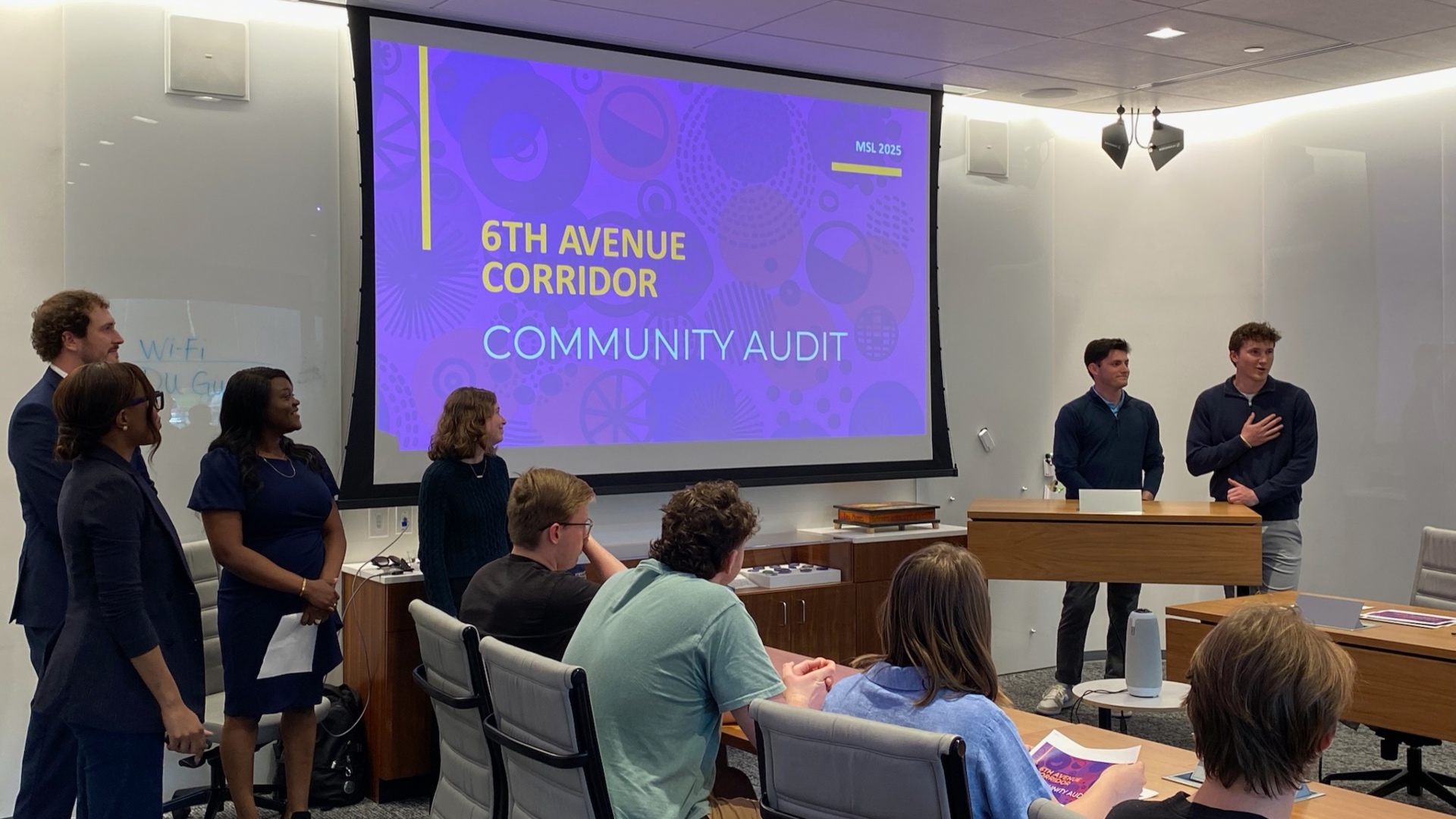 students presenting their community project