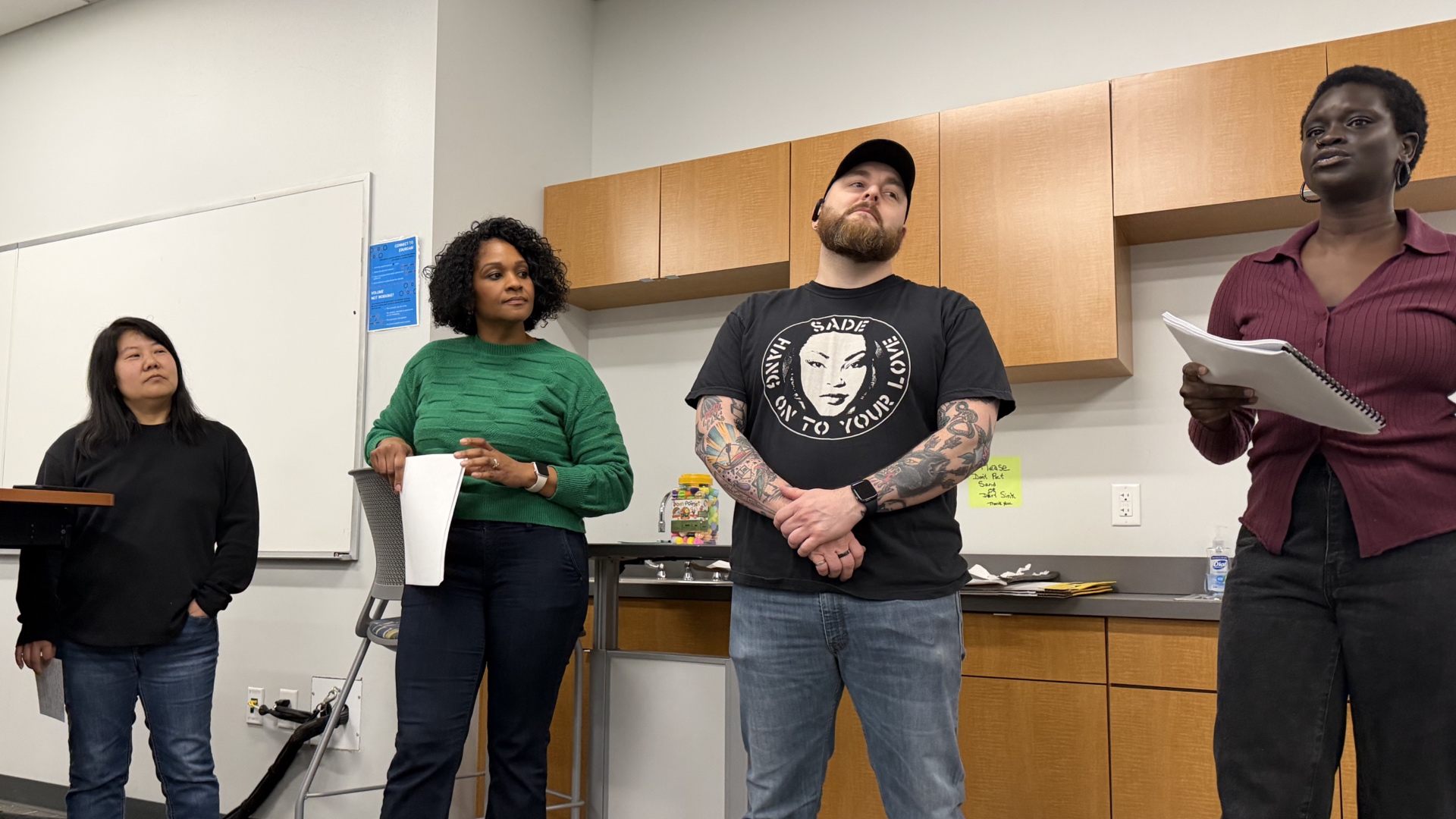 Four counseling students presenting a positive psychology exercise