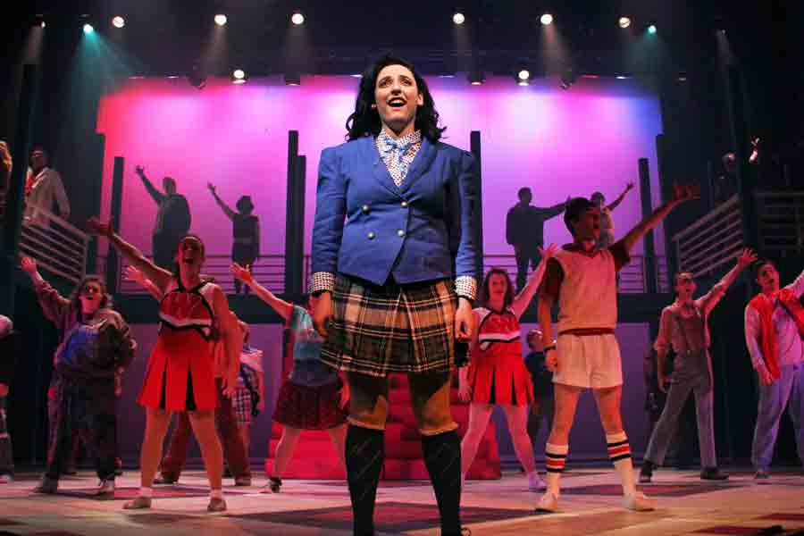 Students on stage during a theatre production