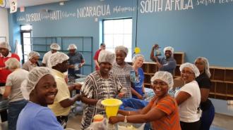 2018 Mandela Washington Fellows volunteering at Meals from the Heartland