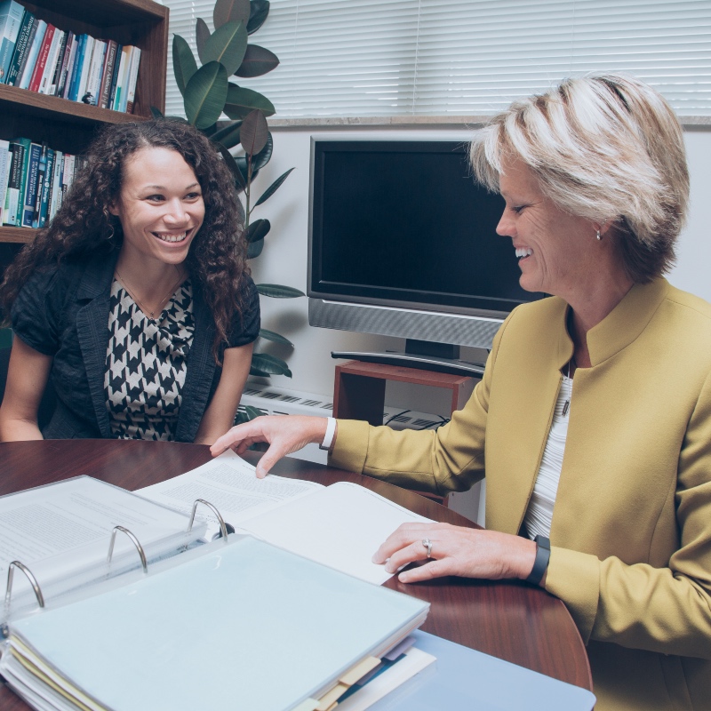 dr cooper working with an education leadership student